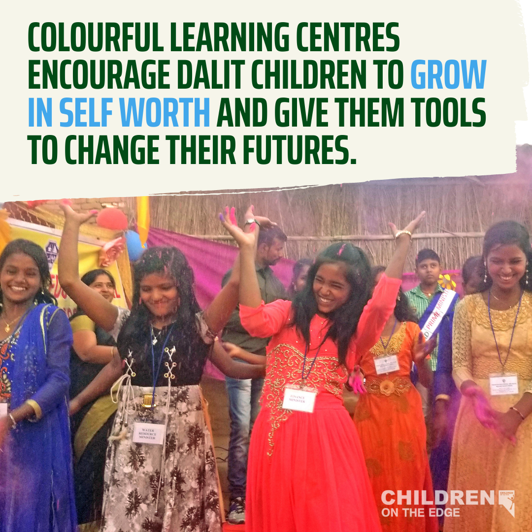 Children throwing bright coloured powder in the air words ' colourful learning centres encourage dalit children to grow in self worth and give them the tools to change their futures. 