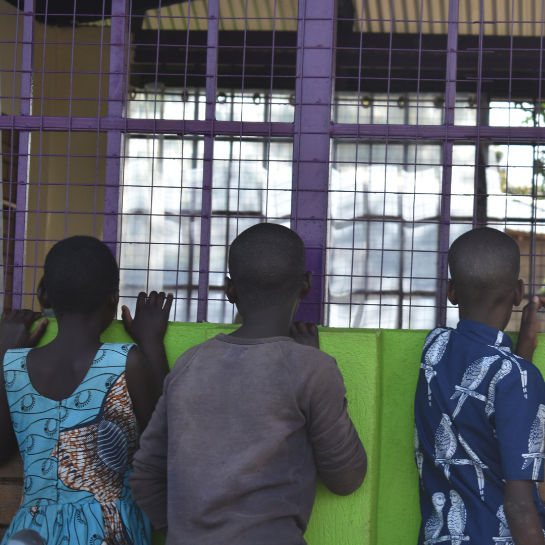 Children looking into the new classrooms