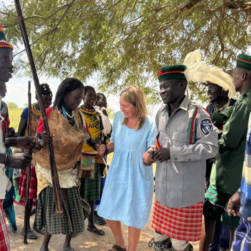 Rachel Bentley with community members in Karamoja