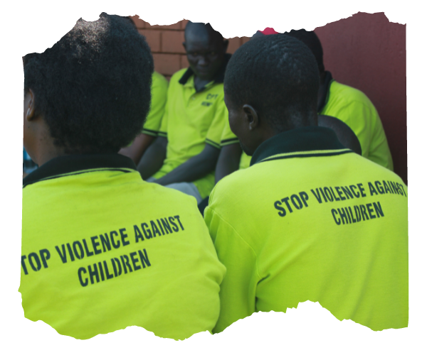 Child Protection Team members wearing bright yellow team tshirts gathering for a meeting.