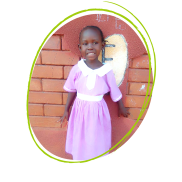 Four year old Namusisi, a Ugandad girl wearing a purple school uniform dress standing outside her brick classroom 
