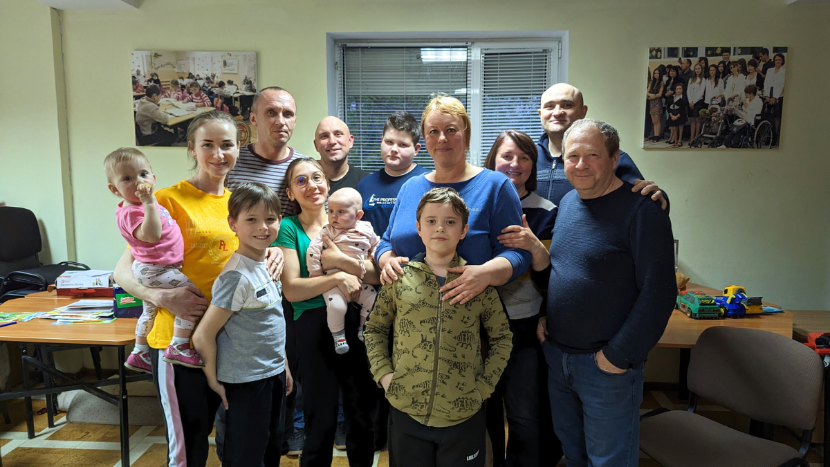 Families who have been supported by the Speranta centre standing together