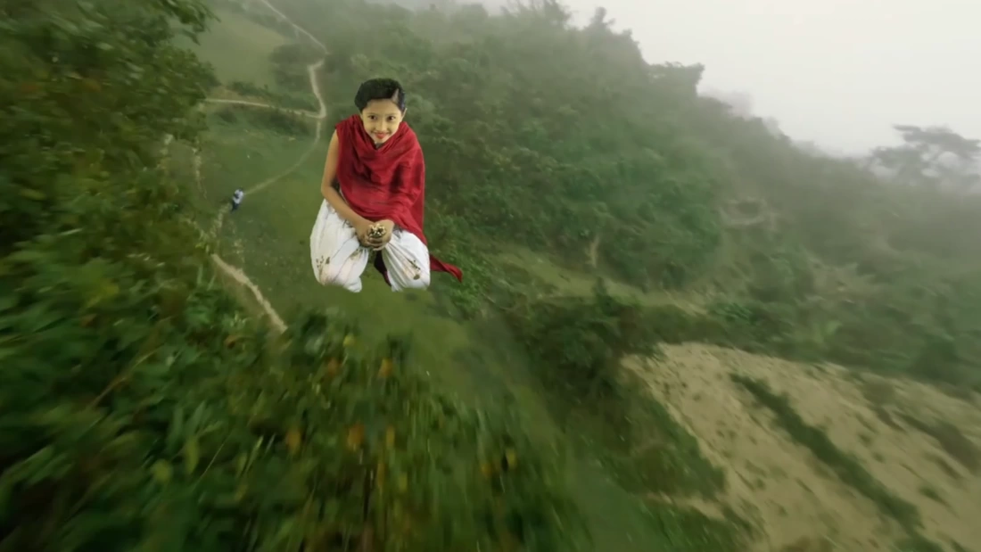 A girl flying on a broom over fields in Myanmar created with the use of green screen technology