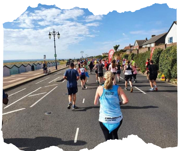 Runners racing along the seafront in Southsea