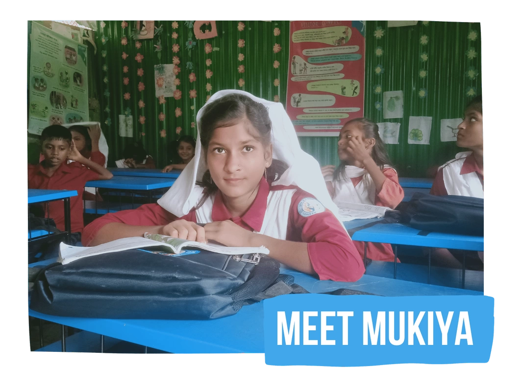 Mukiya sat at her desk in her classroom