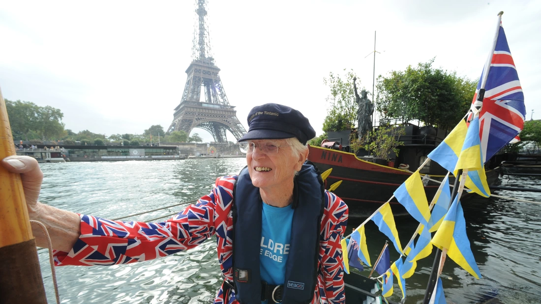 Major Mick on the river Seine rowing near the Effiel tower