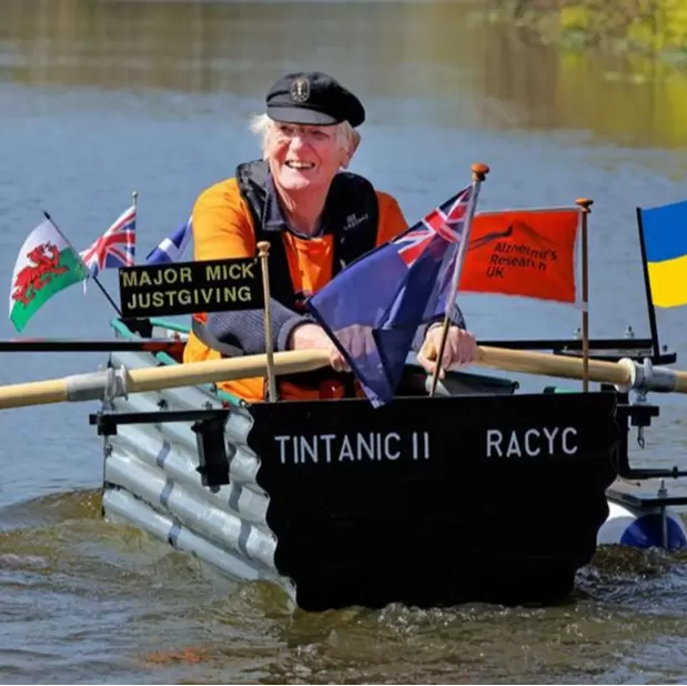  Major Mick rowing his homemade boat