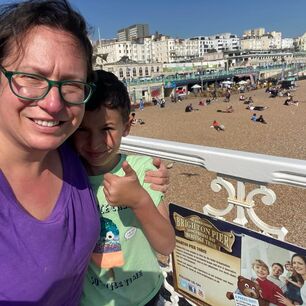Racquel with her son on Brighton Pier