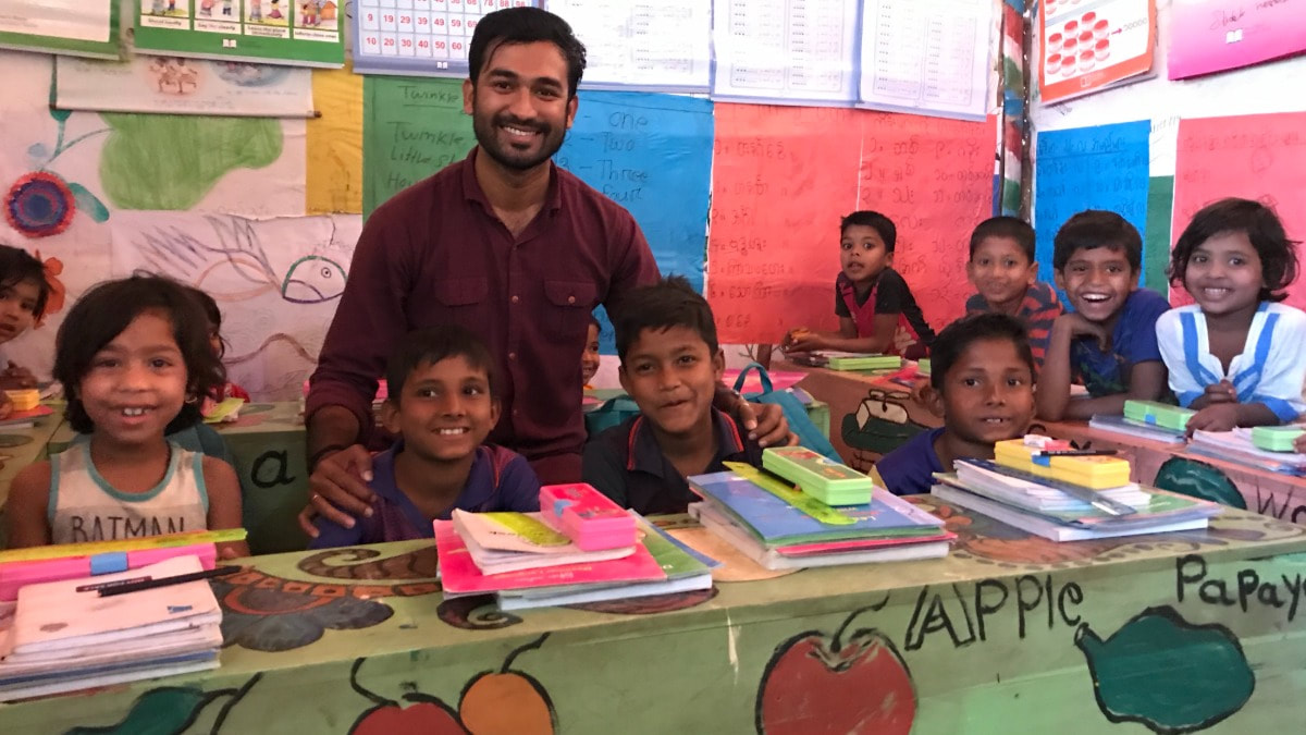 Project Officer Somorjit Das Raju with children in one of the Learning Centre.