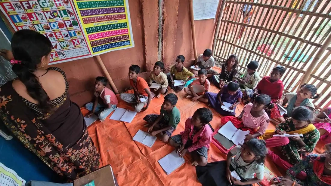 Children at school taking part in a lesson in India