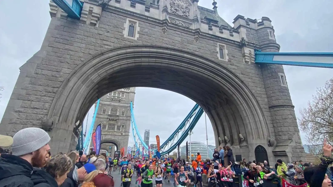London Marathon Runners crossing Tower Bridge