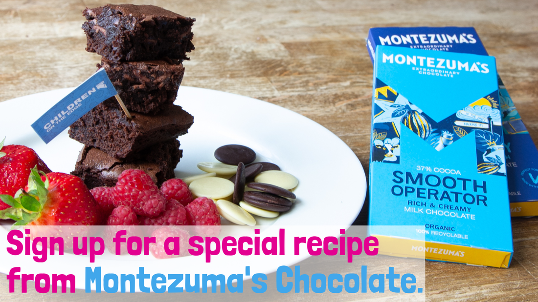 A plate of chocolate brownies and two Montezuma's chocolate bars, with wording that reads 'Sign up for a special recipe from Montezuma's Chocolate'