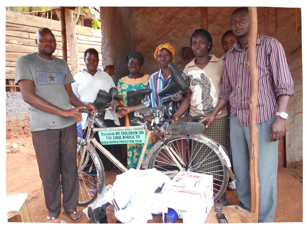 Child Protection Team members with new bike